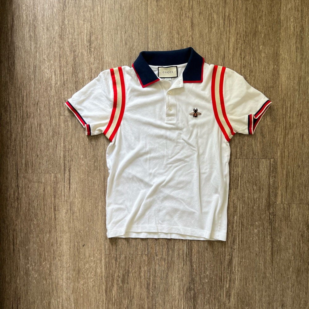 Gucci 
White Polo shirt 
Large